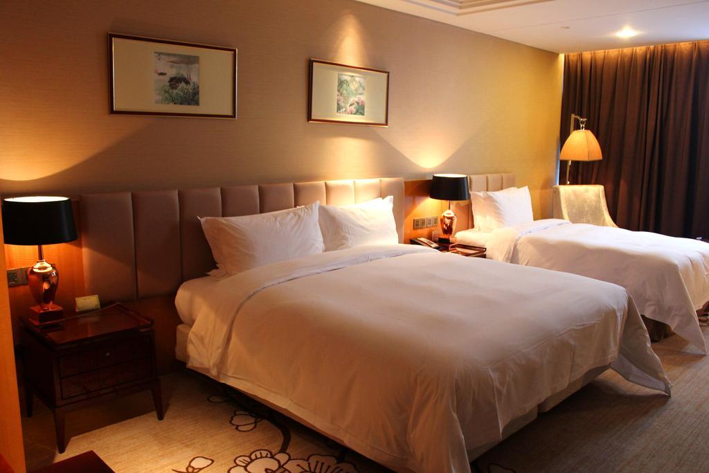 Zhangjiagang Zhonglian Gdh International Hotel Cameră foto