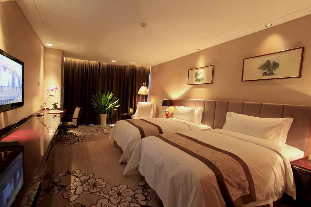 Zhangjiagang Zhonglian Gdh International Hotel Cameră foto