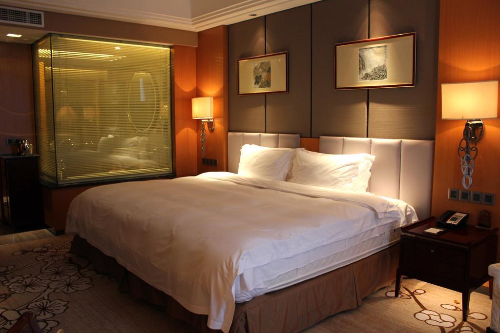 Zhangjiagang Zhonglian Gdh International Hotel Cameră foto