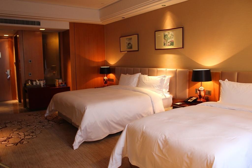 Zhangjiagang Zhonglian Gdh International Hotel Cameră foto